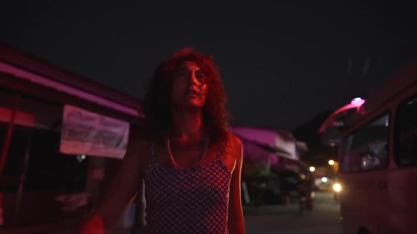 A woman walking into a party