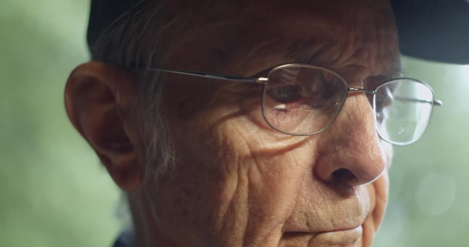 A portrait of an older man outdoors