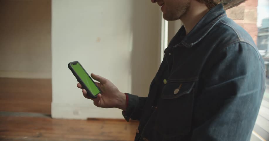 A view of a man using a smartphone