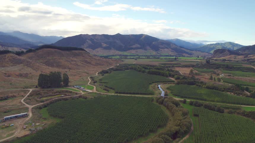 Water runs through the farmland ahead