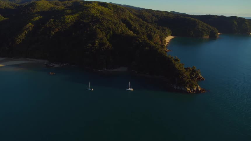 Boats are anchored around the island