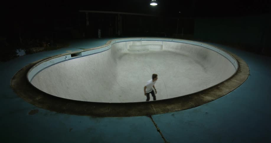 A man skateboarding at a skatepark