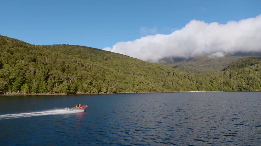 Aerial shot of a boat in a lake