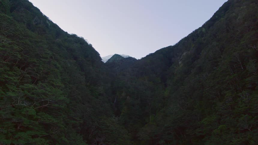 Aerial view of a narrow canyon between mountains at morning