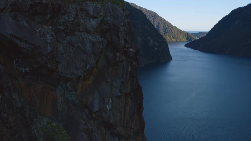Calm lake sits between the mountains