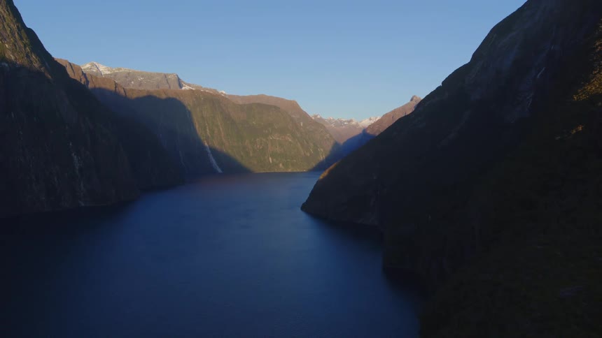 Aerial view of a river flowing through a canyon at morning