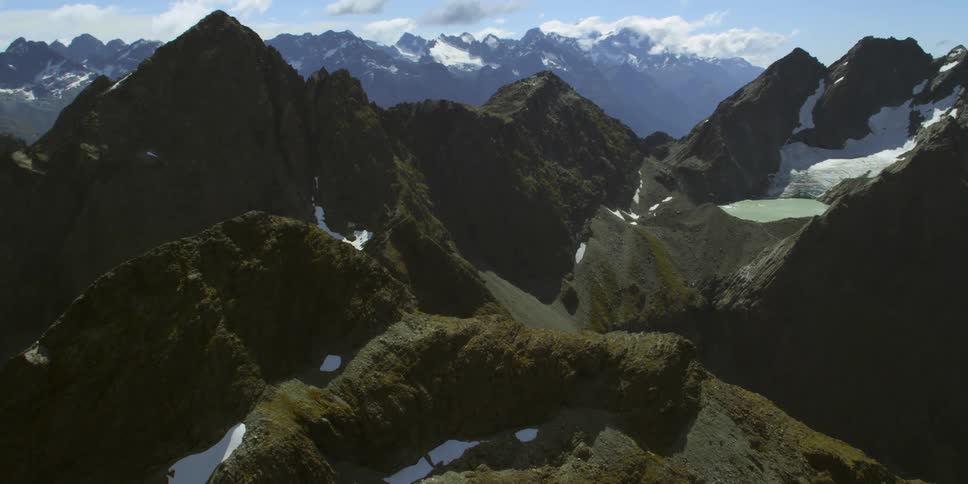 Aerial of glaciers on mountain peaks