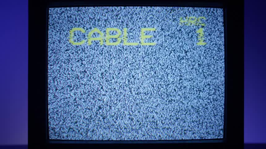Static and text shake on a tube style television screen