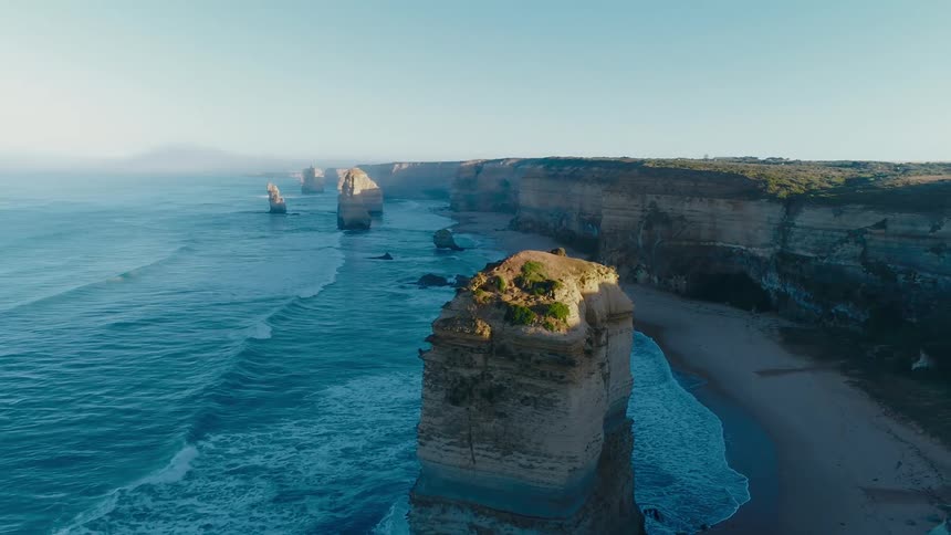 Aerial view of oceanside cliffs with beach