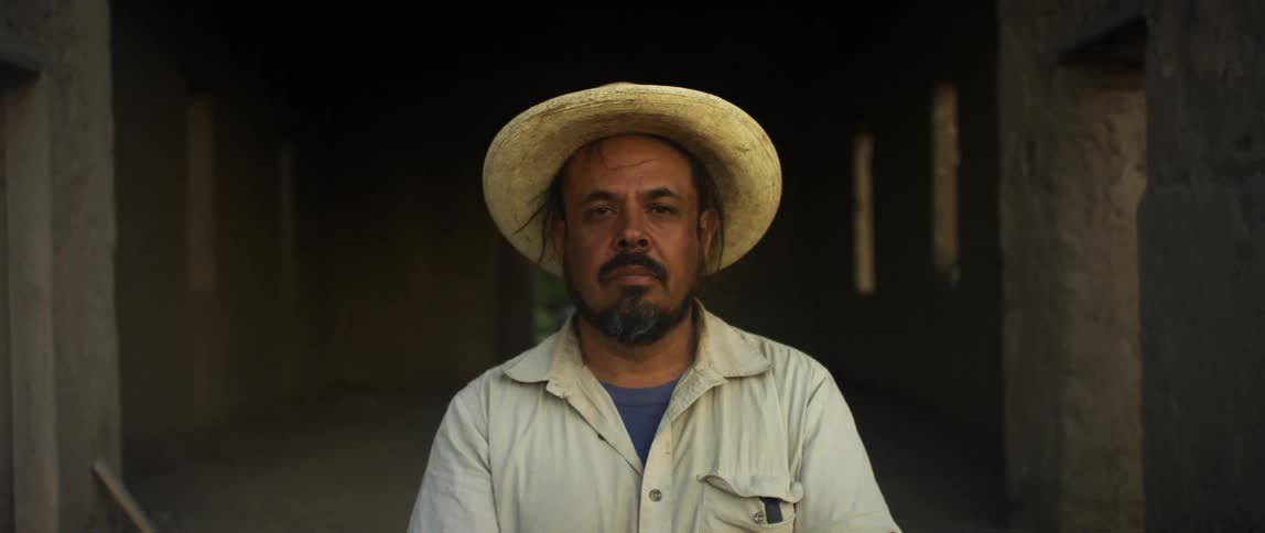 A portrait of a man standing outdoors