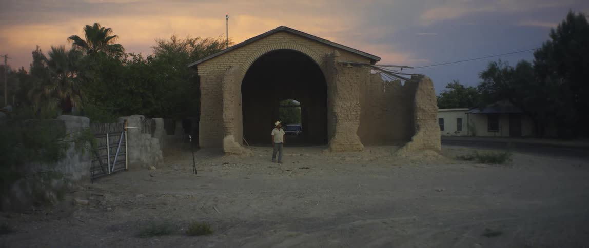 A man walking out of a building