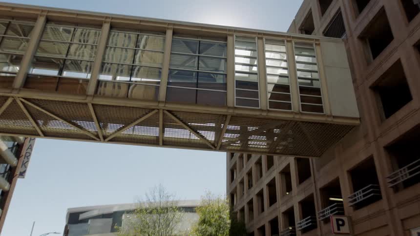 A view of a building and sunlight outdoors