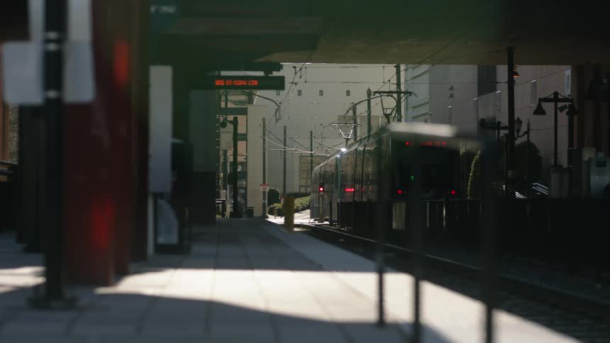 A train leaves the empty train platform