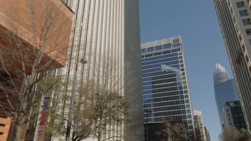 Downtown city buildings high in the sky on a clear day