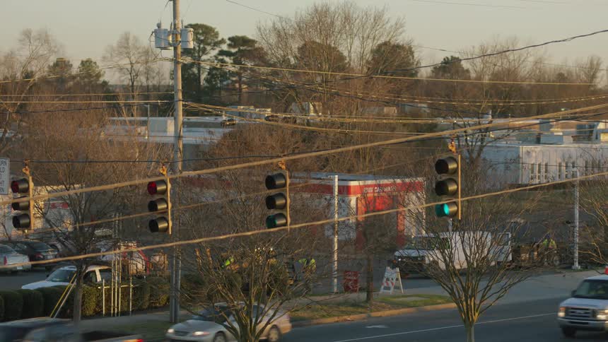 Static shot of a town with a busy road