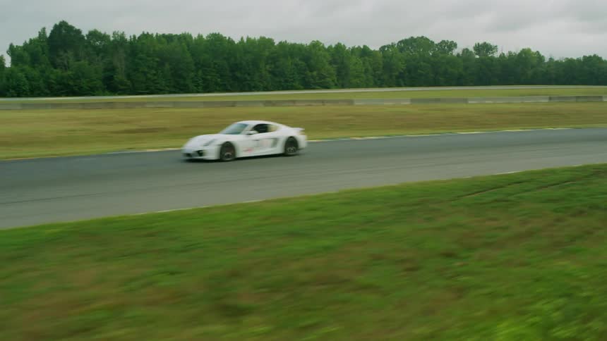 A view of cars racing around a track