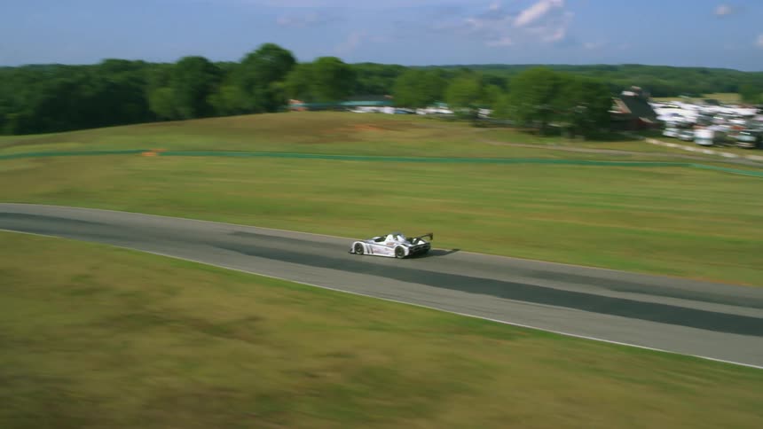 A sports car driving on a race track