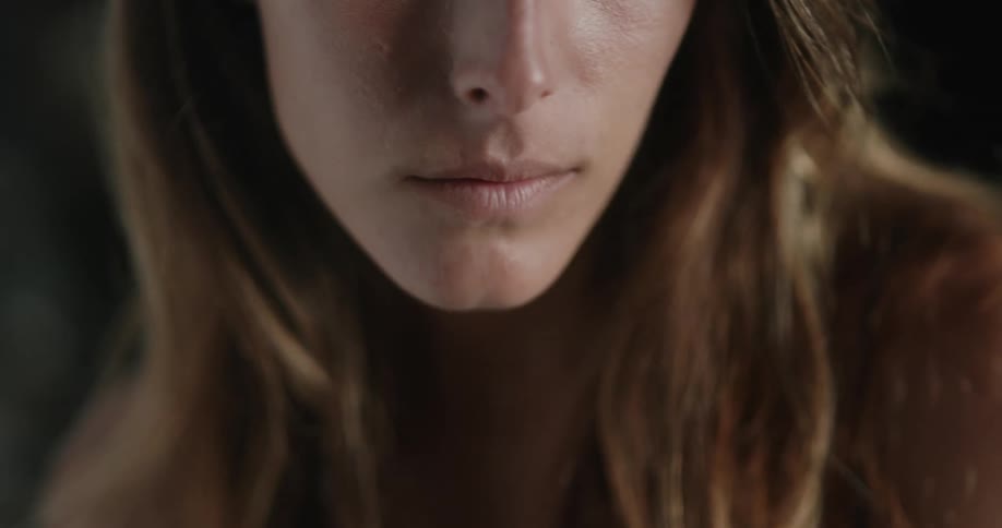 Close up of the lips of a blonde long haired woman