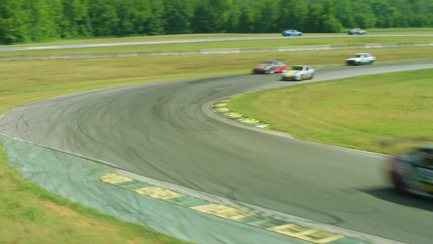 Race cars are competing on the runway