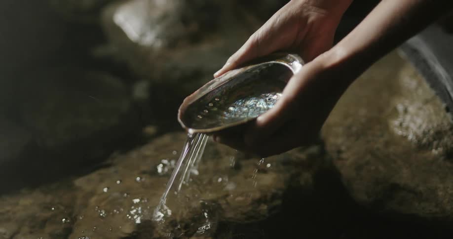 Person scooping water