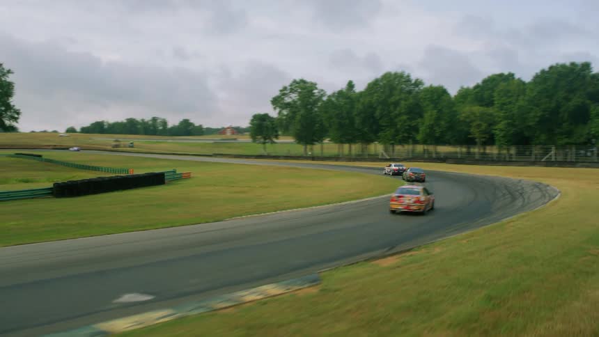Aerial view of cars racing for competition