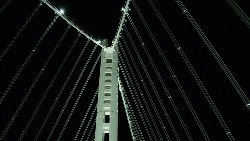 Cables connect to a tall tower on a cable stayed bridge