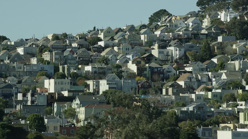 An aerial view of a neighborhood on hills