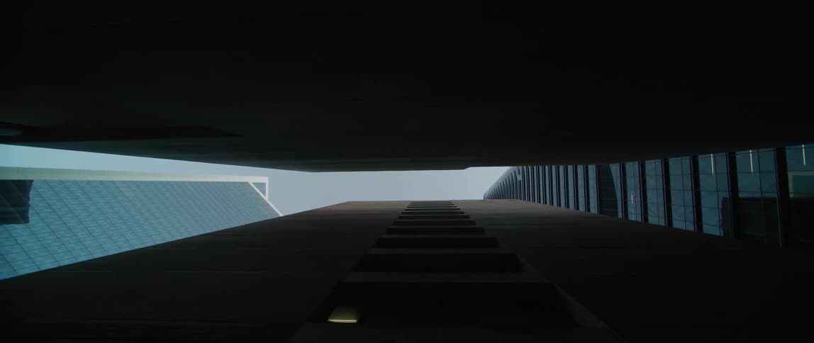 Looking up between two skyscrapers outdoors