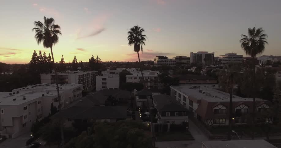 Aerial view of a city at sunset