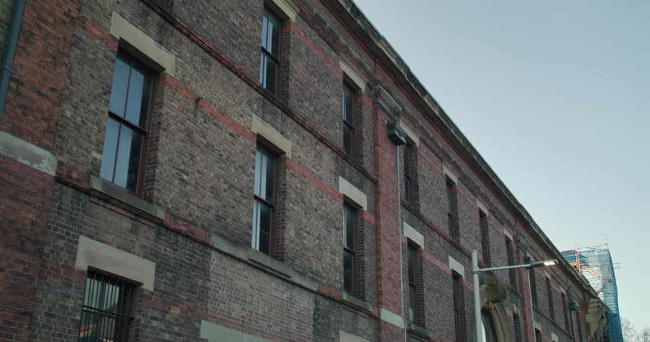 The block is covered with a brick building