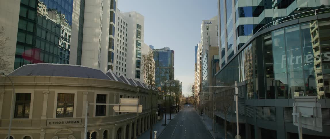 Stores and shops line a downtown street