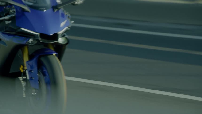 A person is racing on their motorcycle