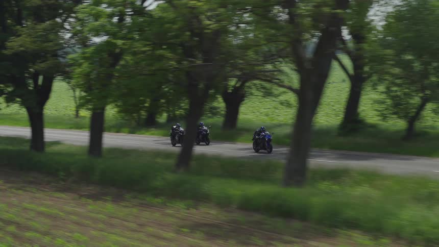 People race on motorcycles on the road