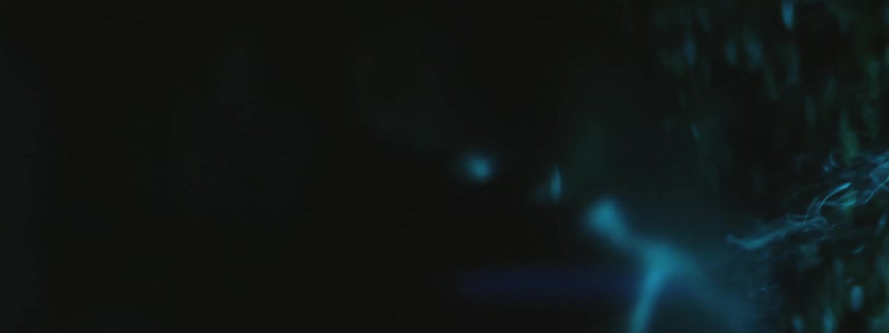 Man lights a cigarette in the darkness