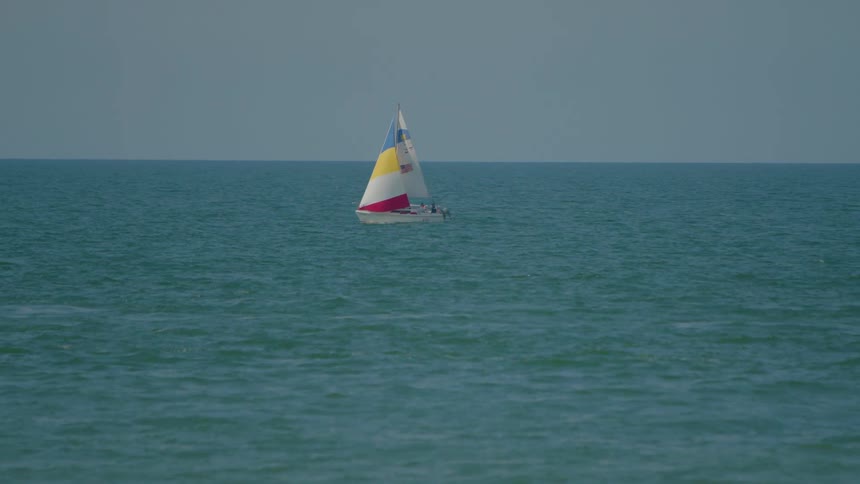 A small boat sailing in the lake