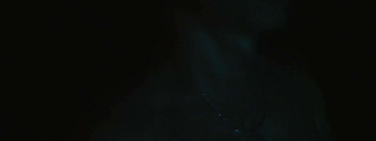 A view of a man with blue lights on him