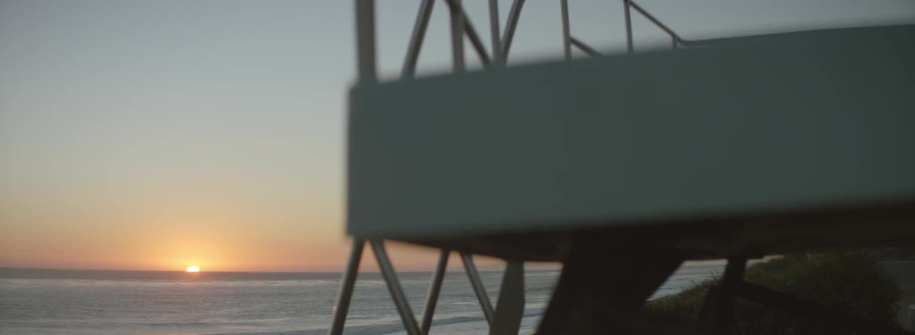 View from a stand on the beach at sunset
