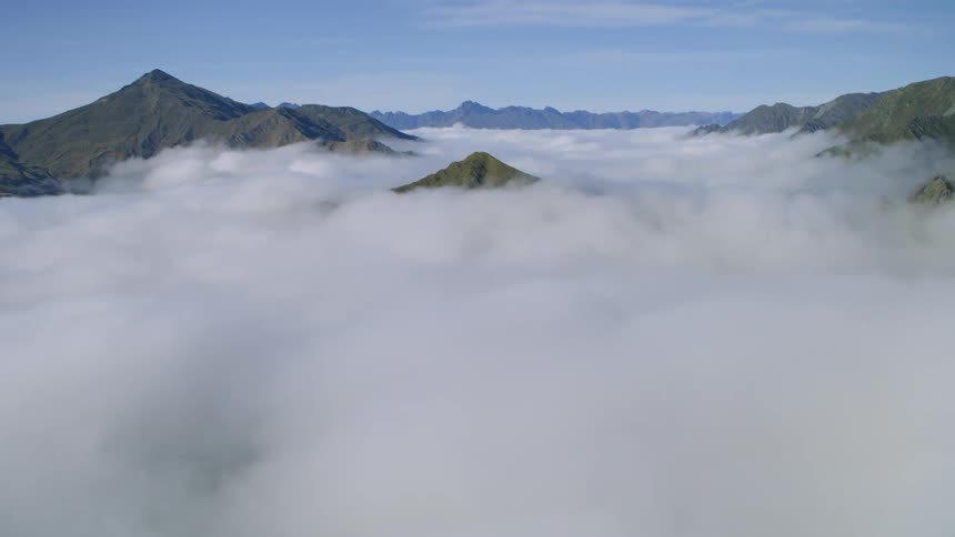 Mountains and peaks high in the clouds