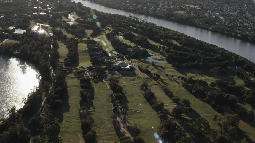 Aerial shot of a town by a river