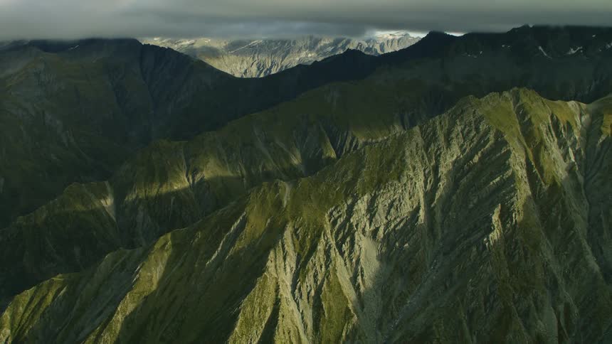 Mountain ridge under a cloudy sky