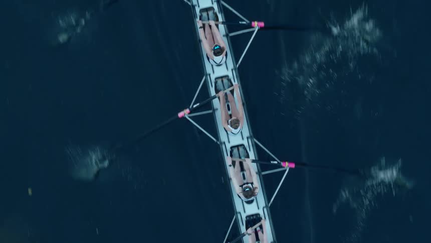 Aerial view of a female rowing team on a rowing scull