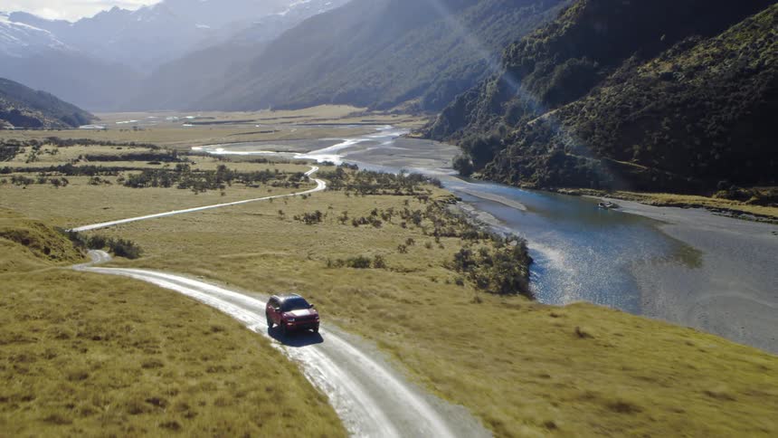 An aerial view of a car driving off road