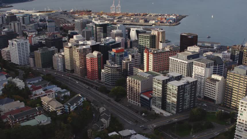 An aerial view of a city near the water