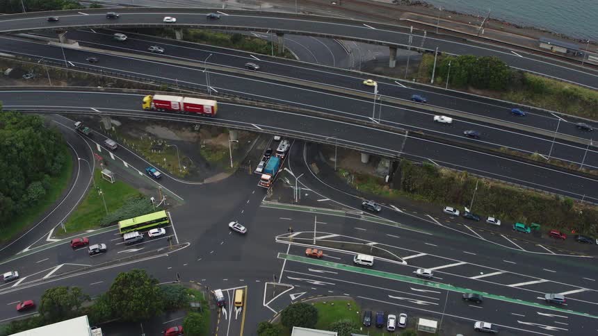 Traffic travels on city streets and highway system