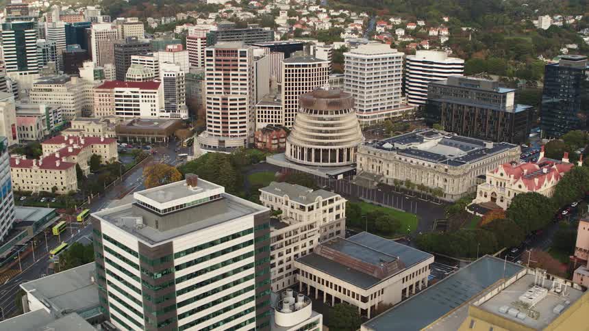 Vehicles drive on the roads through the city