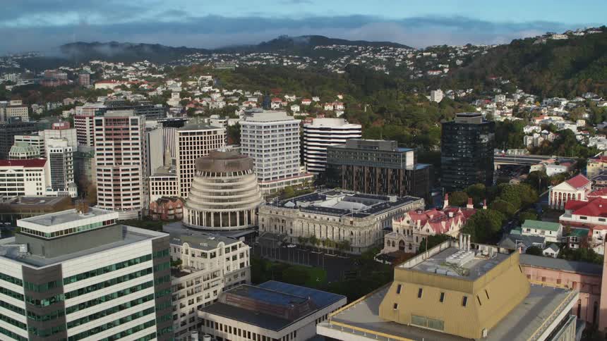 Aerial view of the buildings on the city downtown near the hills