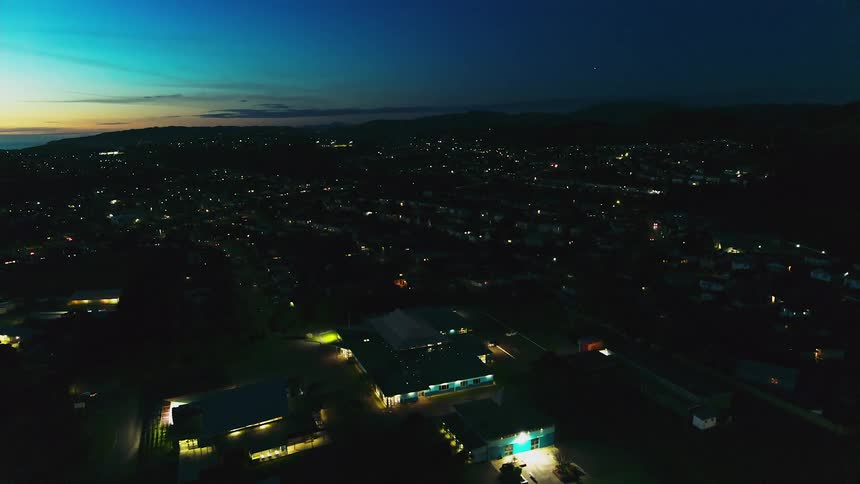 The sun is nearly set on the city