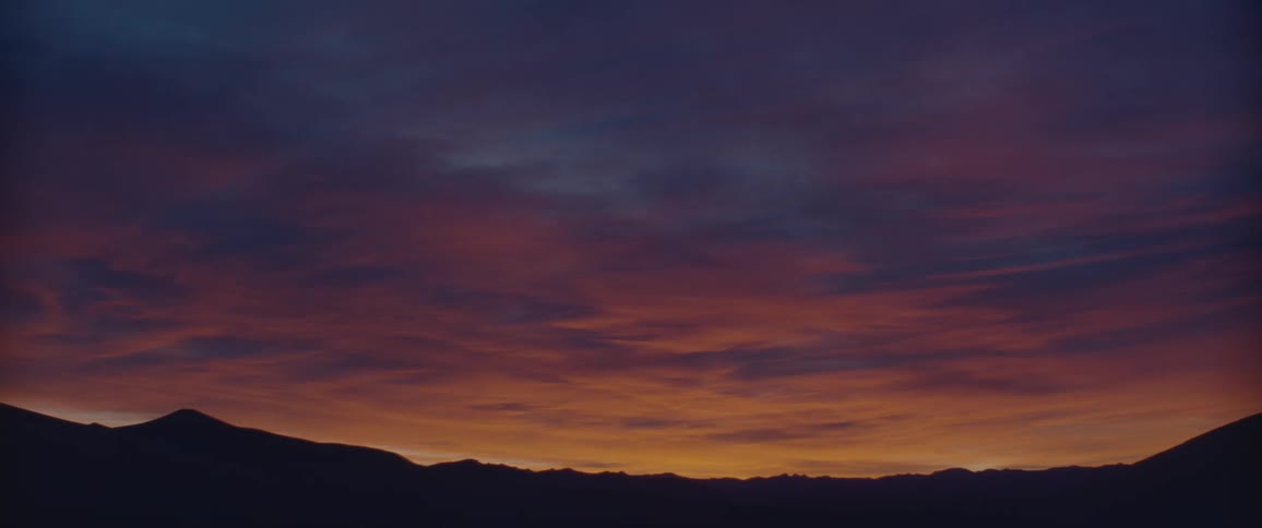 Red sky over the mountains at dusk