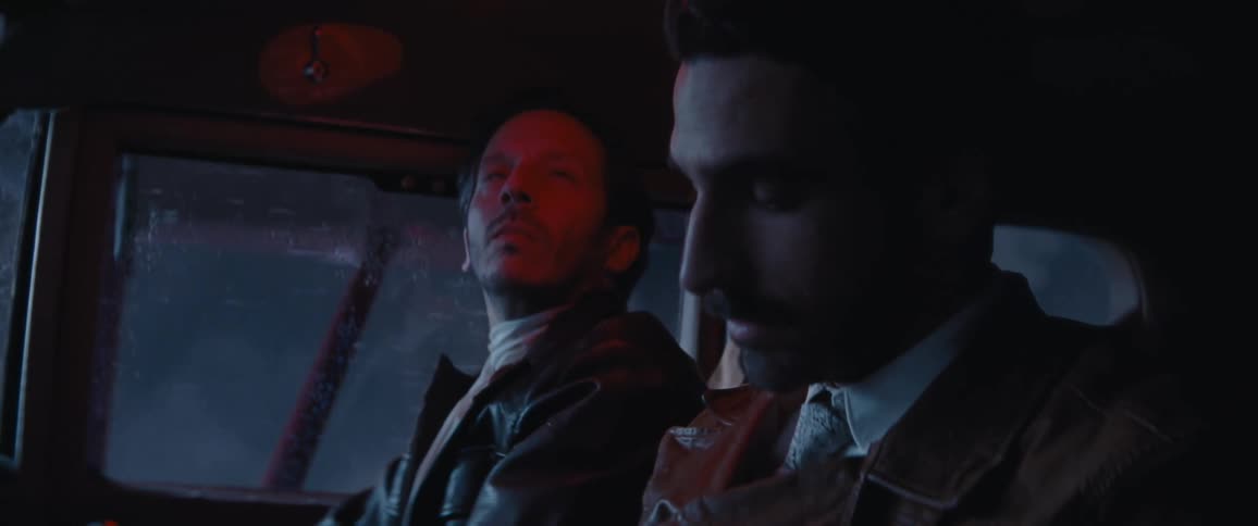 Two people are riding in the plane together