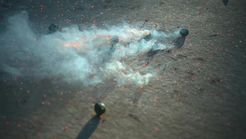 Small balls explode on the ground